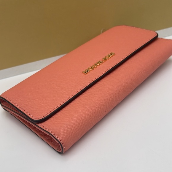 MICHAEL KORS JET SET TRAVEL LARGE TRIFOLD WALLET SHERBERT COLOR
NWT - Picture 10 of 16